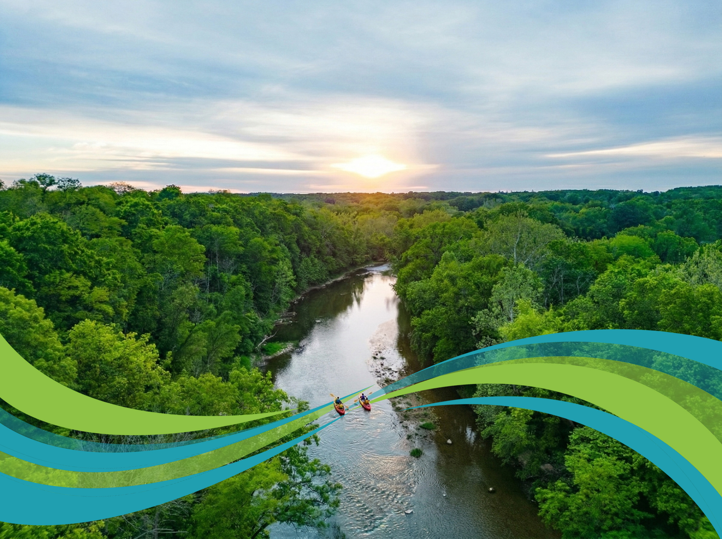 Two kayakers paddling down the Sugar Creek River